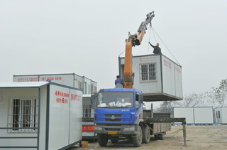 Illustration for article titled China's "Cabinet Tribe" Lives in Shipping Containers